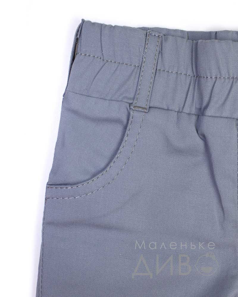 Брюки з манжетами